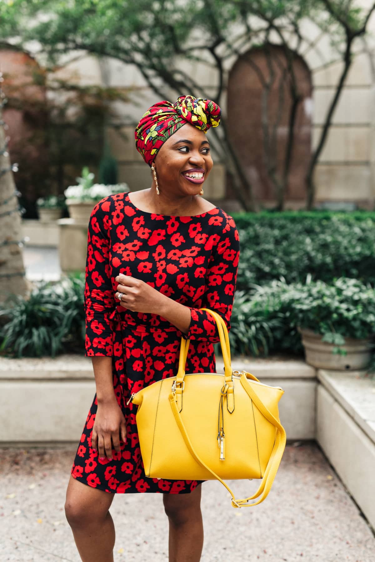 Celebrating the union between two cultures rocking an ankara head wrap with a floral dress perfect for spring and summer fashion. And sharing the best places to score the most stylish African print scarves for women. #africanfashion #floraldress #ankarastyles #turban