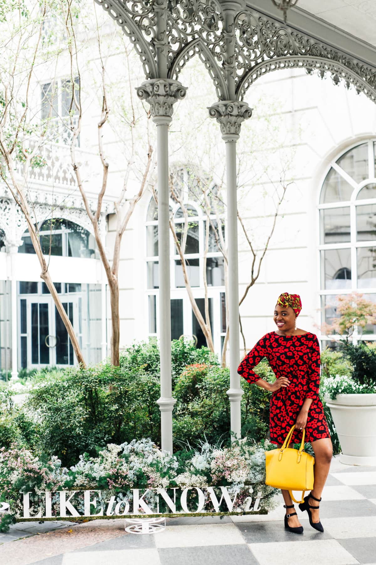 Celebrating the union between two cultures rocking an ankara head wrap with a floral dress perfect for spring and summer fashion. And sharing the best places to score the most stylish African print scarves for women. #africanfashion #floraldress #ankarastyles #turban