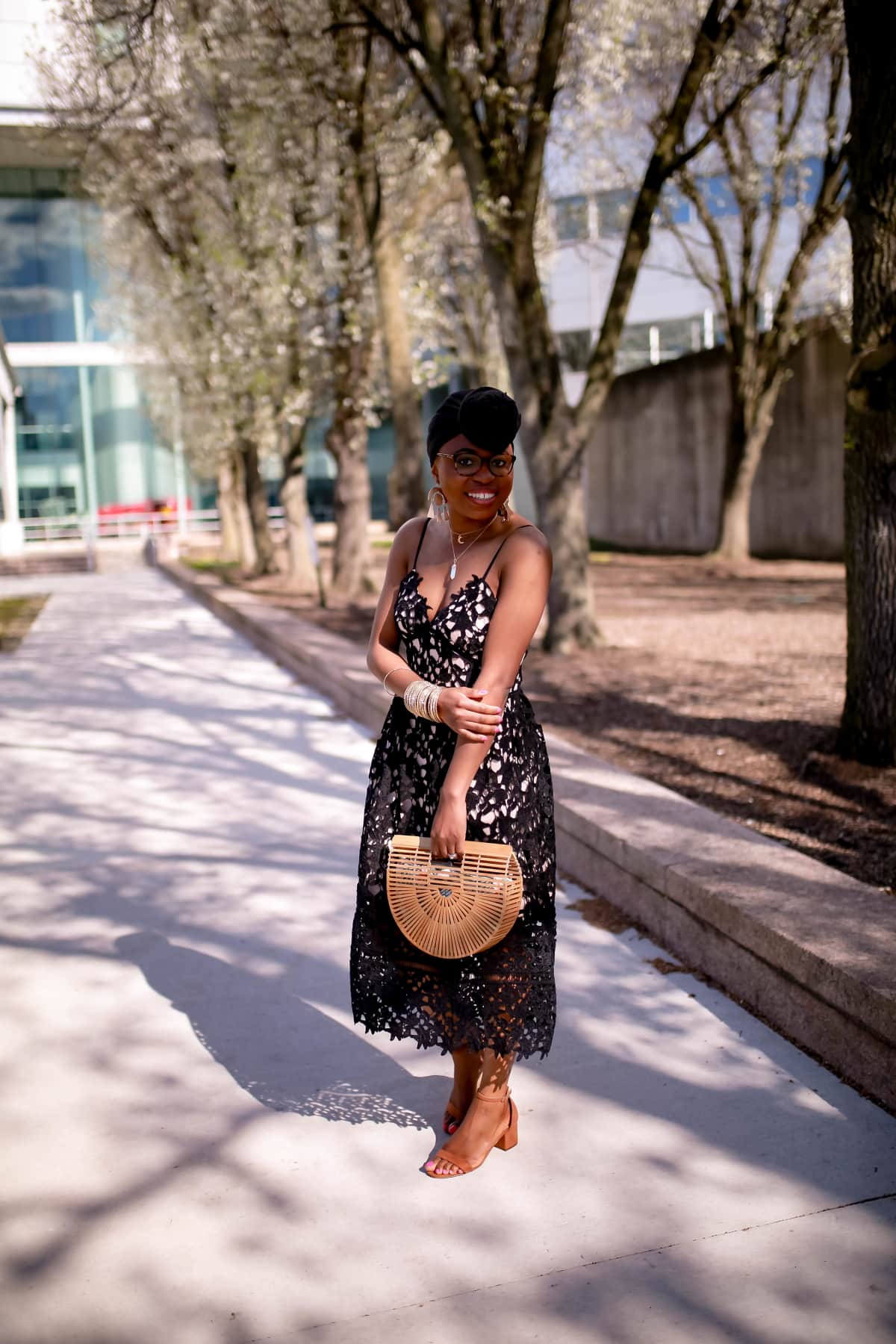 THIS cute black lace midi dress is the new “little black dress”. You won't guess how much this midi dress costs! Plus over 15 best options for wedding guests, graduation, and birthday parties. #mididress #graduationdress #sleevelessdress