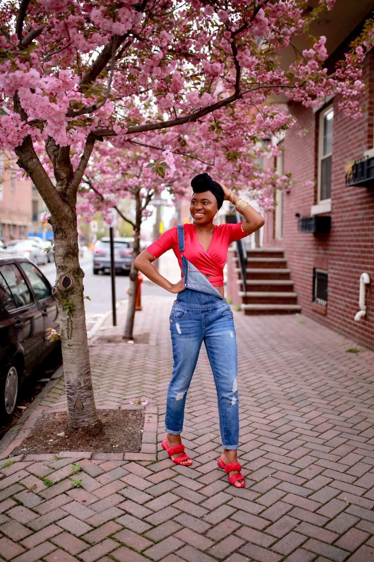 New Jersey fashion blogger shows us her favorite way to wear the distressed denim overalls trend. Regain that youthful vibe for a day out or dress it up for work and meetings. #distressedjeans #overalls