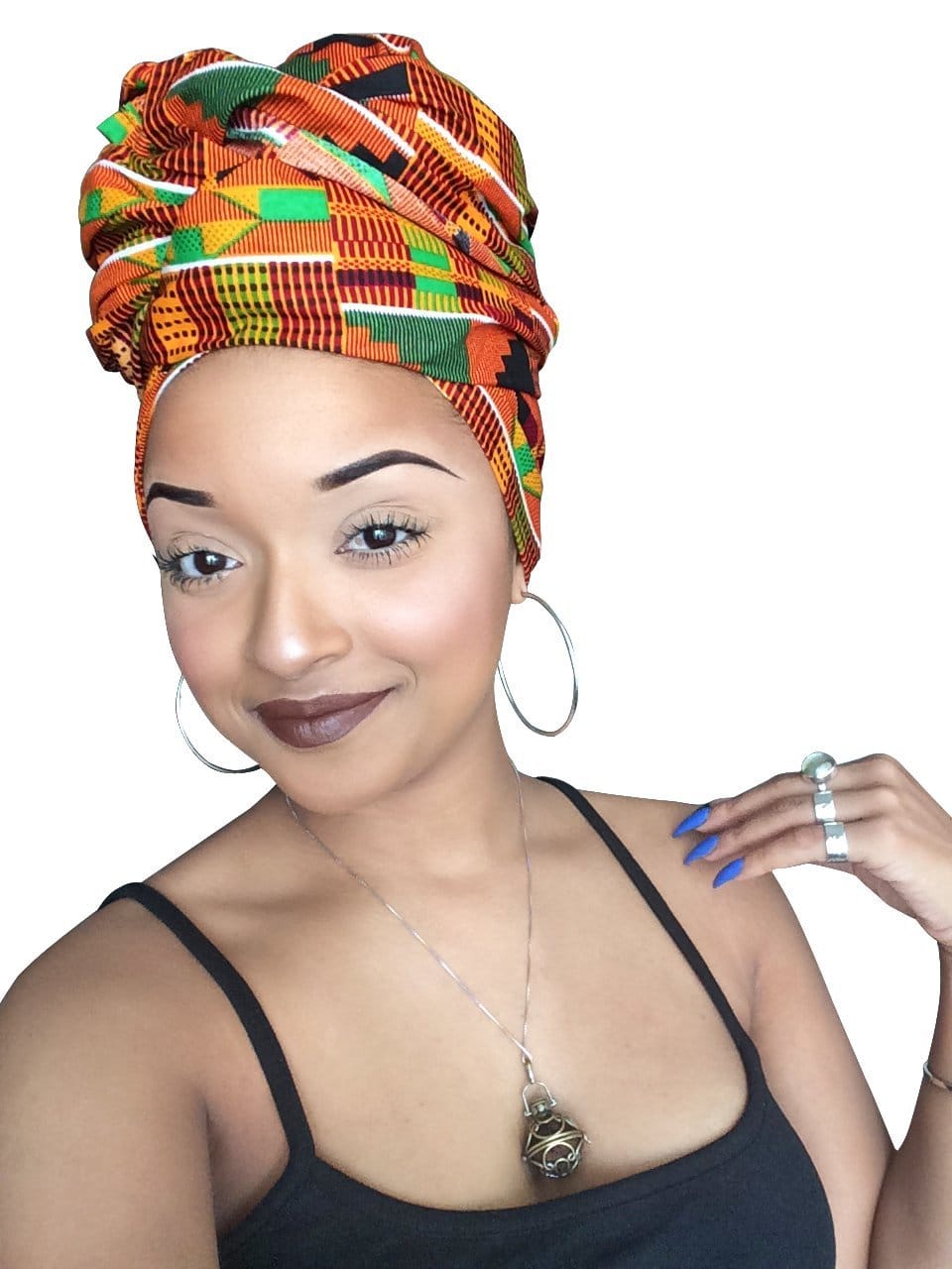 New Jersey fashion blogger rounds up for top African head wraps with details on where you can get these one-of-a-kind ankara headscarves. Keep reading to get the scoop. All your favorite styles in one place (+find out where to get them). Click to see all! #africanfashionoutfits #kente #headscarf
