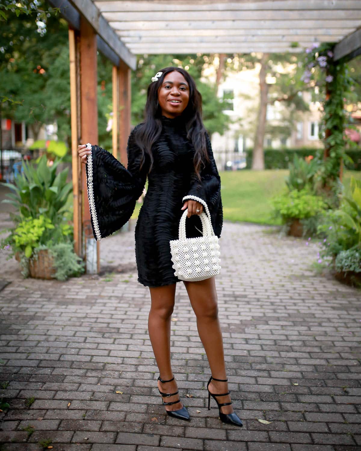 #littleblackdress #blackdressesforwomen A classic and chic LBD that stands out from the endless sea of little black dresses. This gorgeous dress is a modern twist on a classic style. You'll thank me later! #weddingguestdress