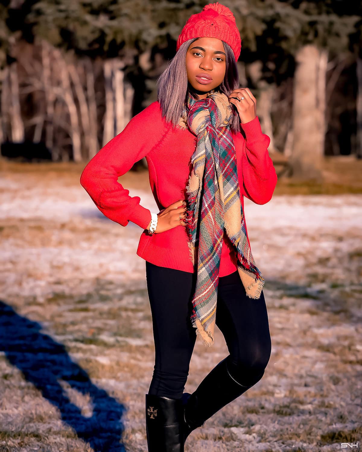 Louisa wearing a pair of Tory Burch boots