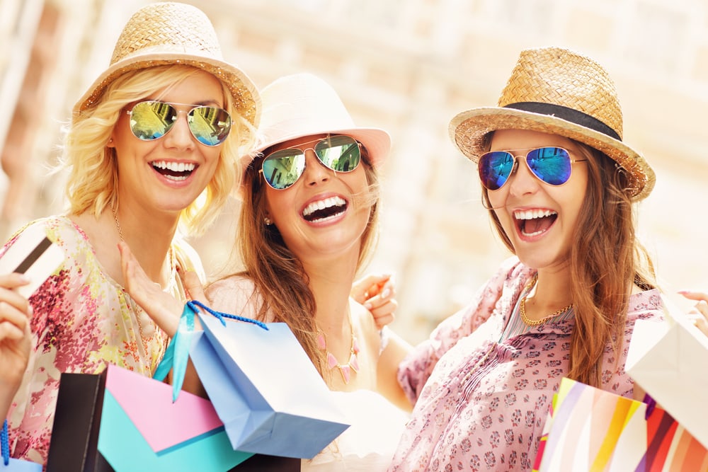 Girls Holding Paper Bags