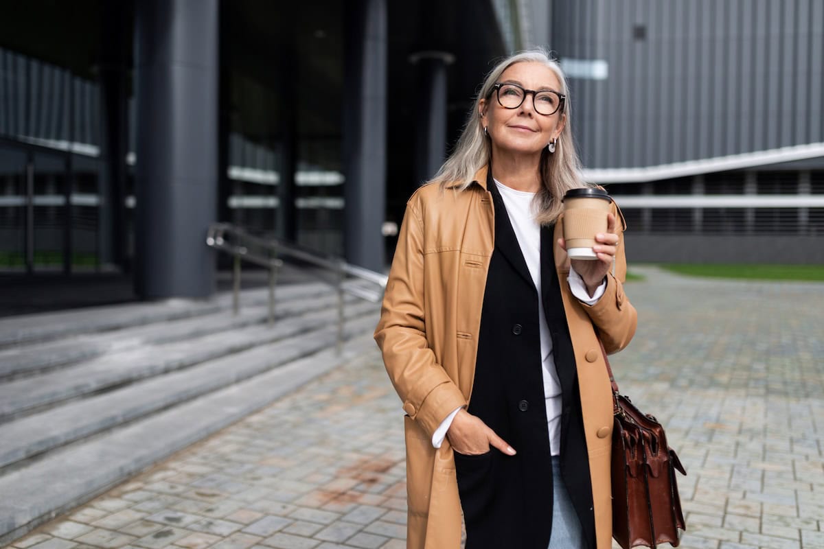 caucasian senior businesswoman with a cup of coffe 2023 11 27 05 18 05 utc