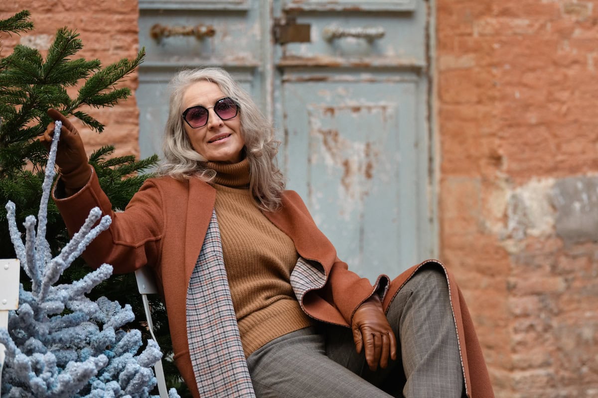 a stylish woman in terracotta coat and leather glo 2024 12 05 14 14 59 utc