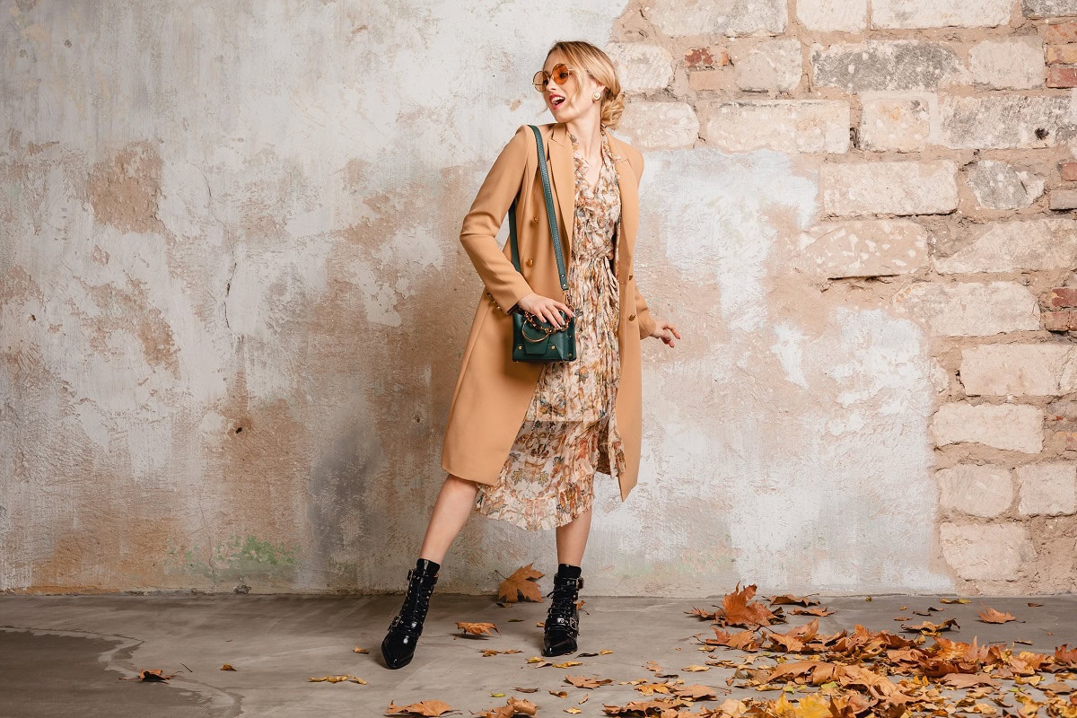 attractive stylish blonde woman in beige coat spr 2024 10 18 03 22 25 utc