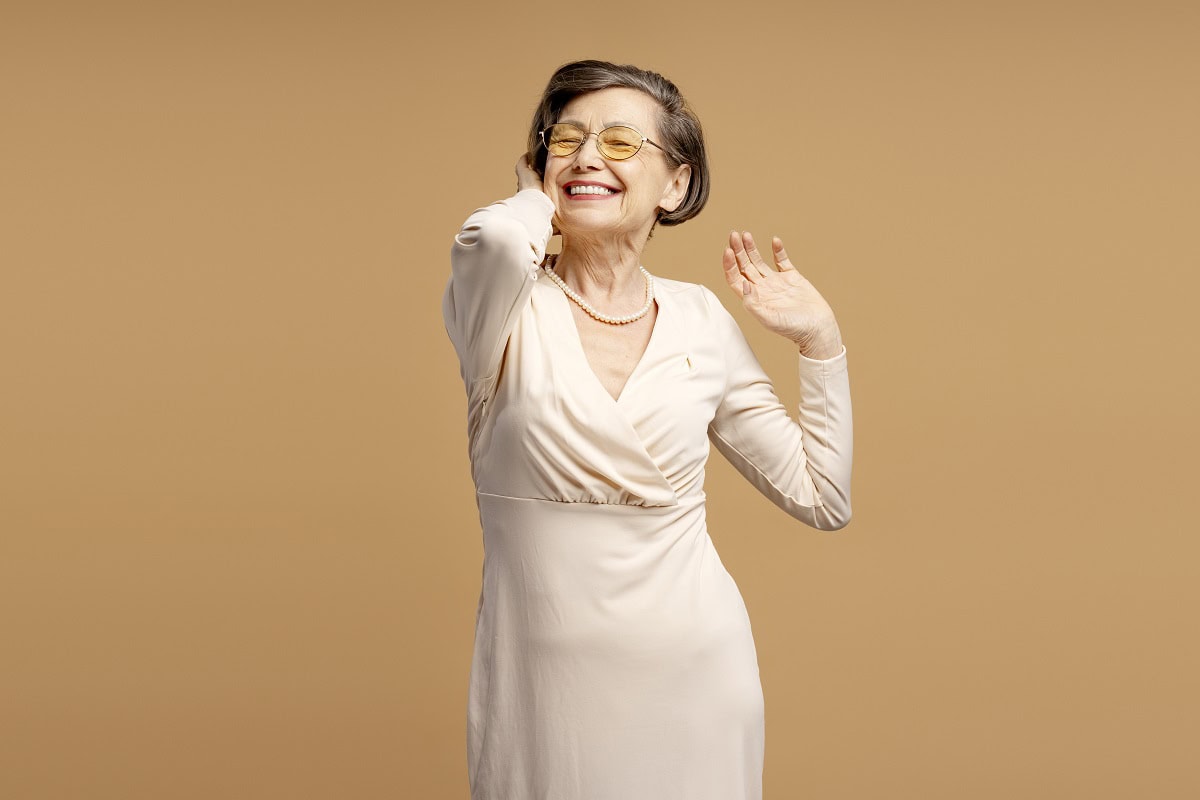 elegant senior woman wearing glasses is laughing a 2025 02 19 01 01 51 utc