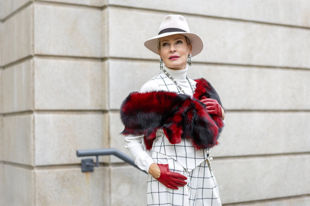 fashionable mature woman walking outside in city d 2025 01 16 12 01 37 utc