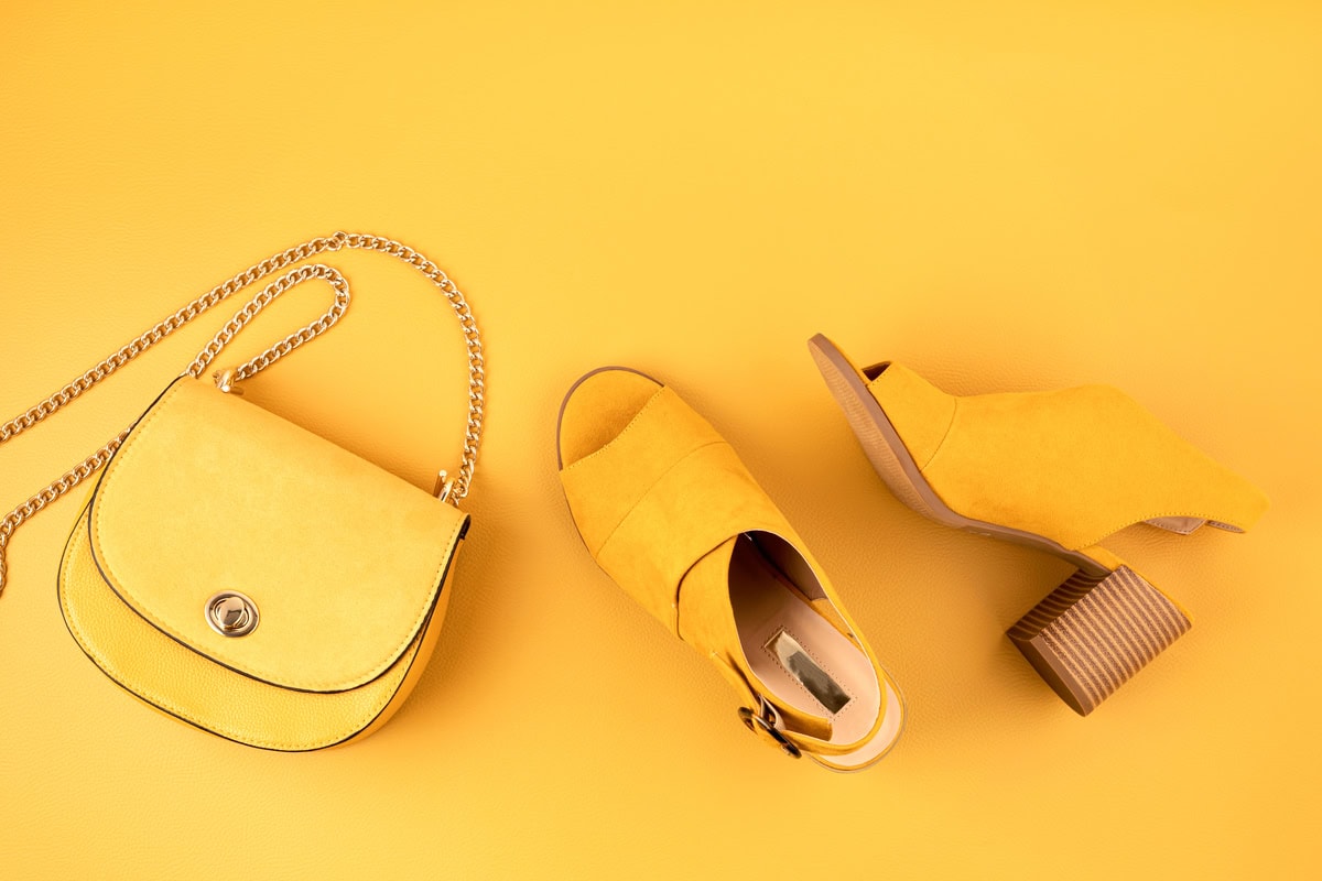 flat lay with woman fashion accessories in yellow 2023 11 27 04 51 16 utc