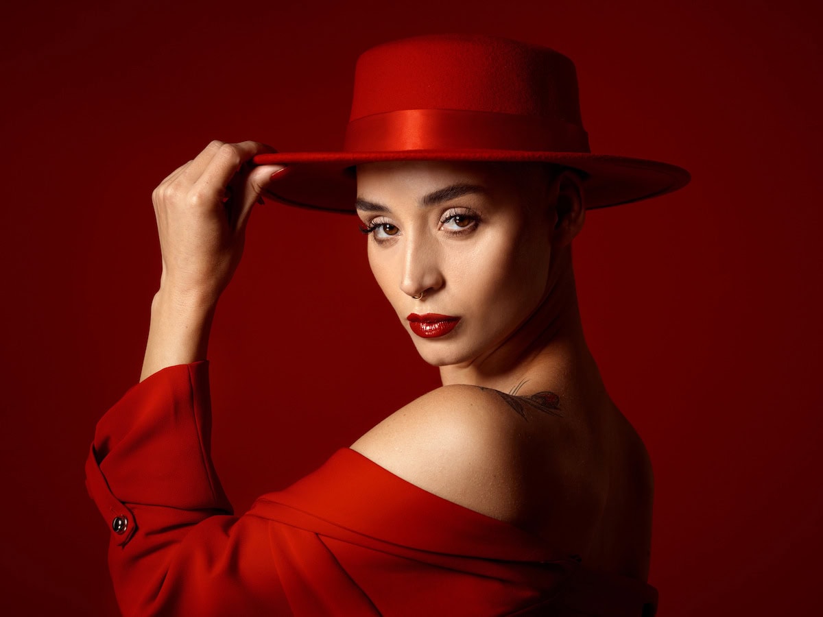 portrait fashion and a confident woman on a red s 2023 11 27 05 31 19 utc