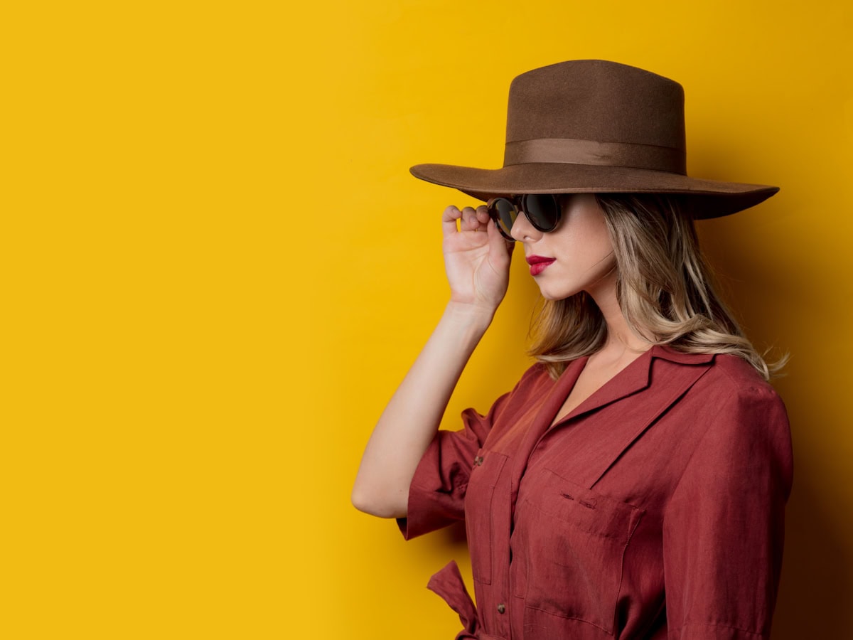 woman in 1940s style clothes and sunglasses 2024 09 25 13 03 07 utc