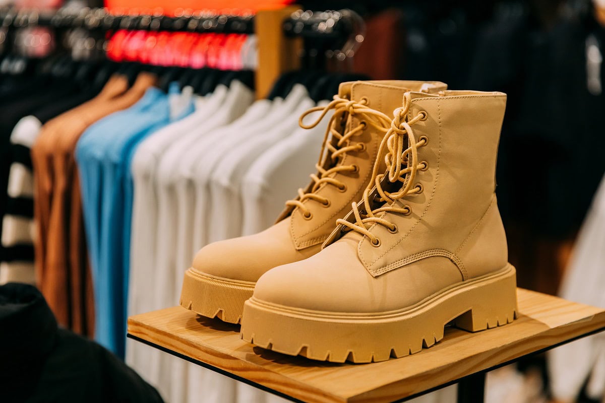 yellow leather unisex boots on shelf display in sh 2023 11 27 05 22 38 utc 1