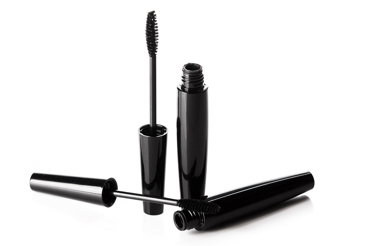 black mascara brushes and containers on white back 2024 10 18 04 59 50 utc
