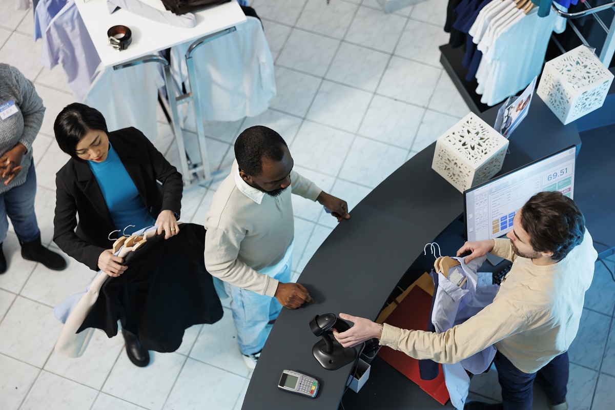 cashier scanning and processing purchase 2025 02 17 08 51 55 utc