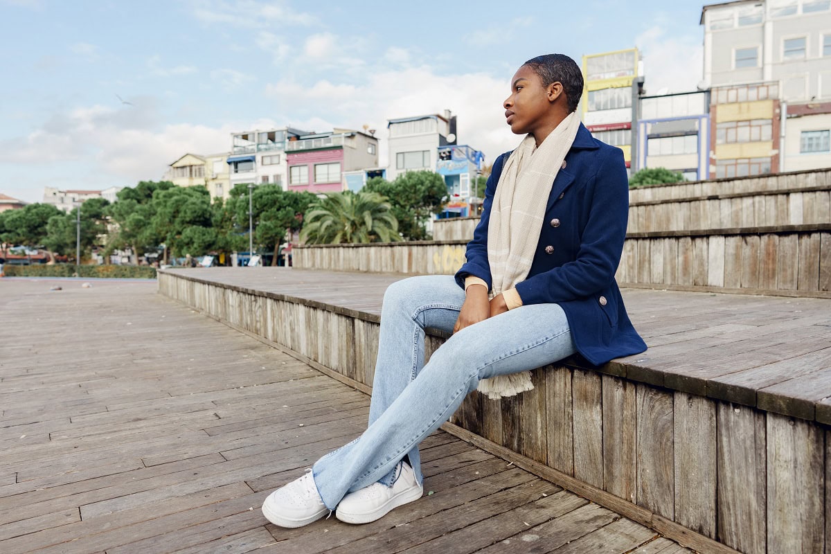 portrait of young african woman sitting outside in 2025 02 24 16 06 46 utc