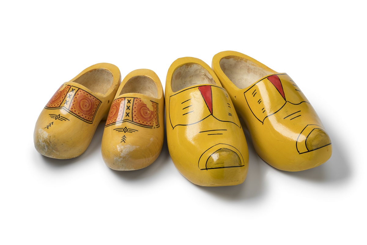 two pairs of traditional yellow dutch wooden shoes 2023 11 27 05 26 25 utc