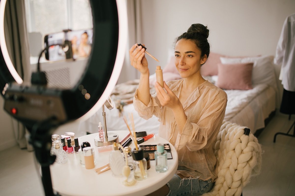 young woman blogger recording video makeup tutoria 2024 12 01 15 18 18 utc