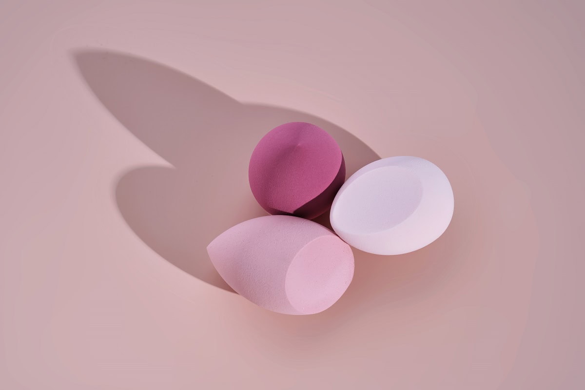 a set of makeup sponges on a pink background 2025 03 14 17 46 48 utc
