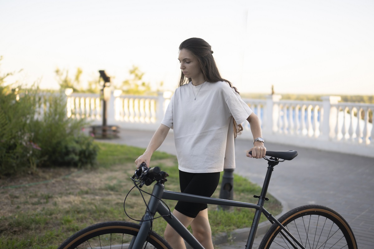 a woman in a white shirt walks alongside a black b 2025 01 26 23 42 08 utc