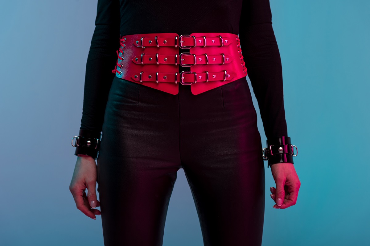 attractive hot girl wearing wide red belt isolated 2024 11 11 23 32 14 utc