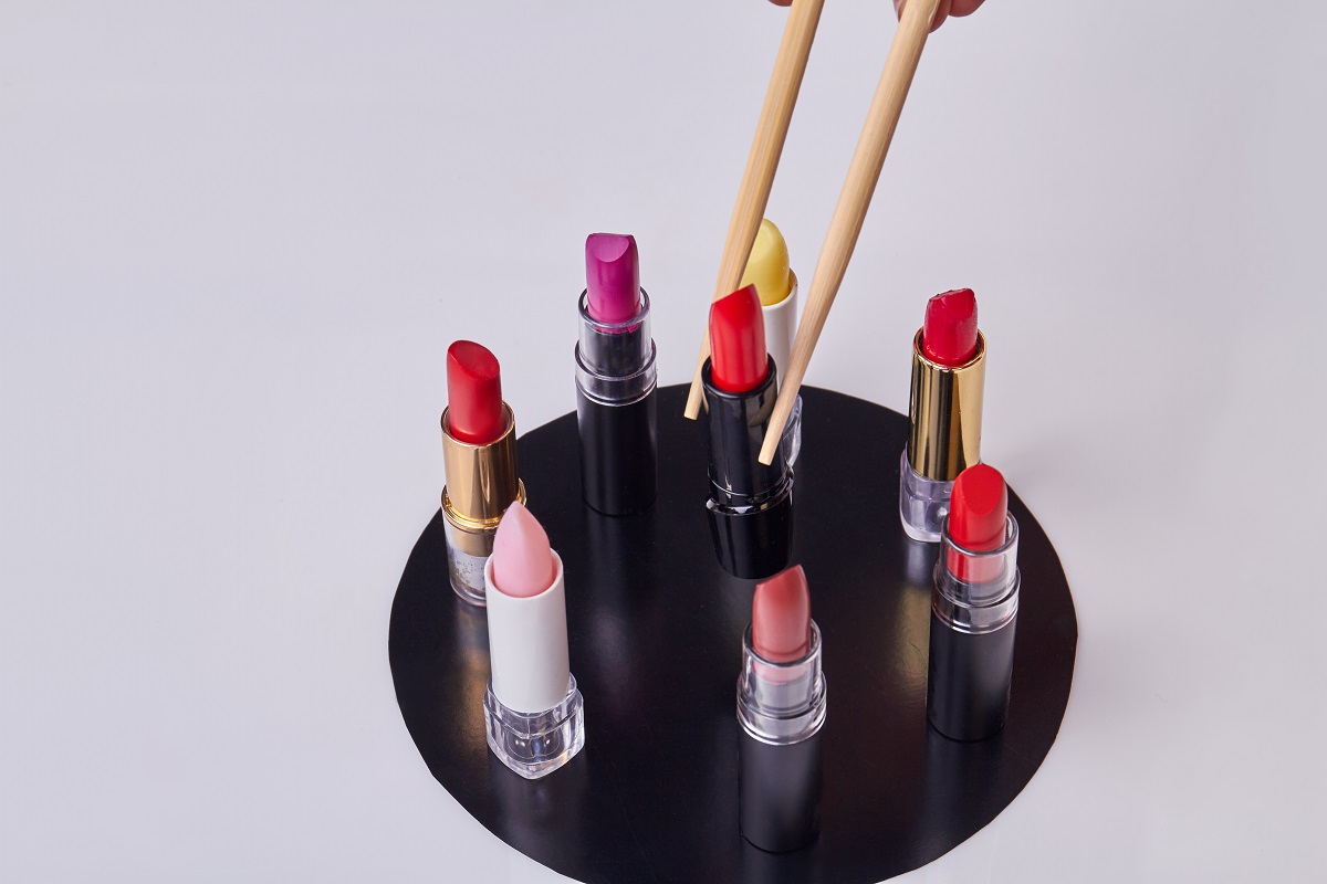 close up wooden sticks taking red lipstick 2024 09 18 02 31 29 utc