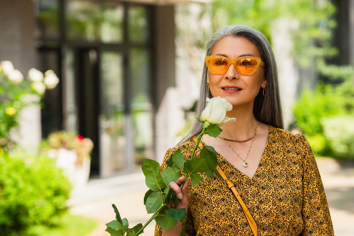 stylish asian woman in patterned blouse and sungla 2024 11 13 06 52 16 utc