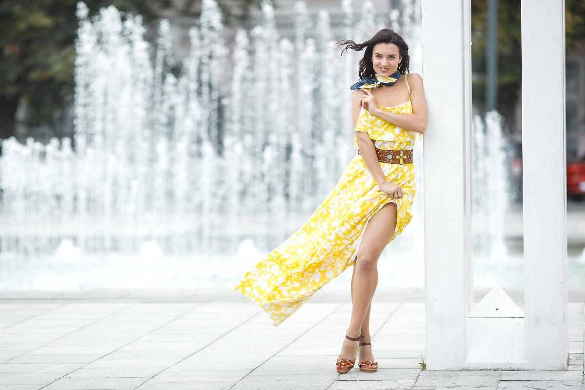 woman holding dress