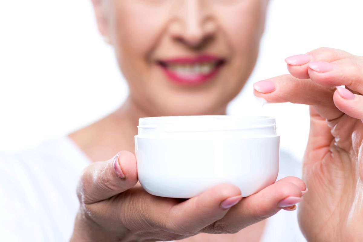 Senior woman with face creamDmitryPoch