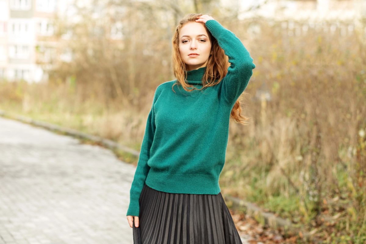 plead skirt and sweater